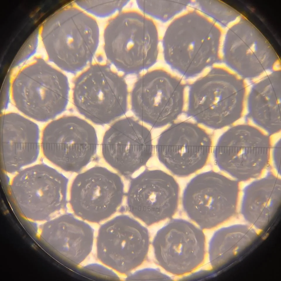 Anilox cells viewed under a microscope after laser cleaning