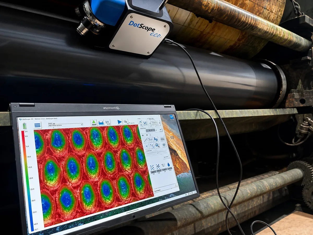 Portable anilox inspection system set up on a press during an on-site visit
